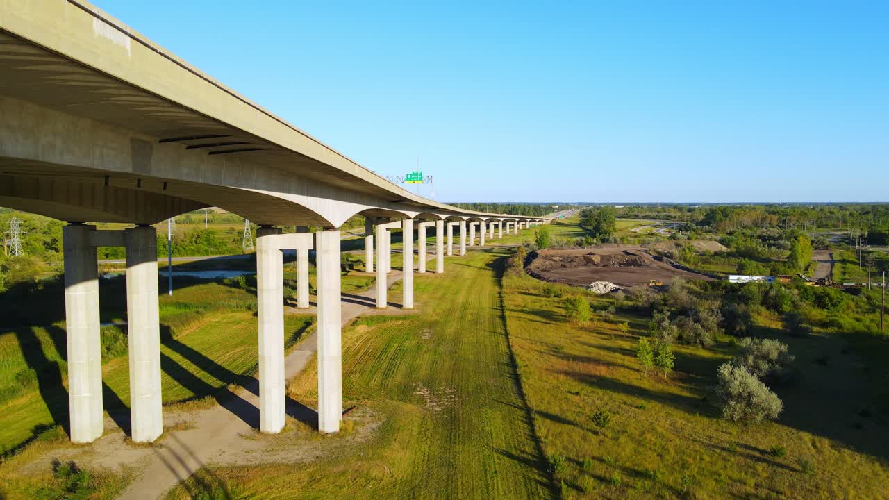 High poles of Zilwaukee Bridge for highway I-75 in Michigan, aerial ascend view
