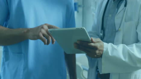 animation of data processing with world map over diverse doctors using tablet