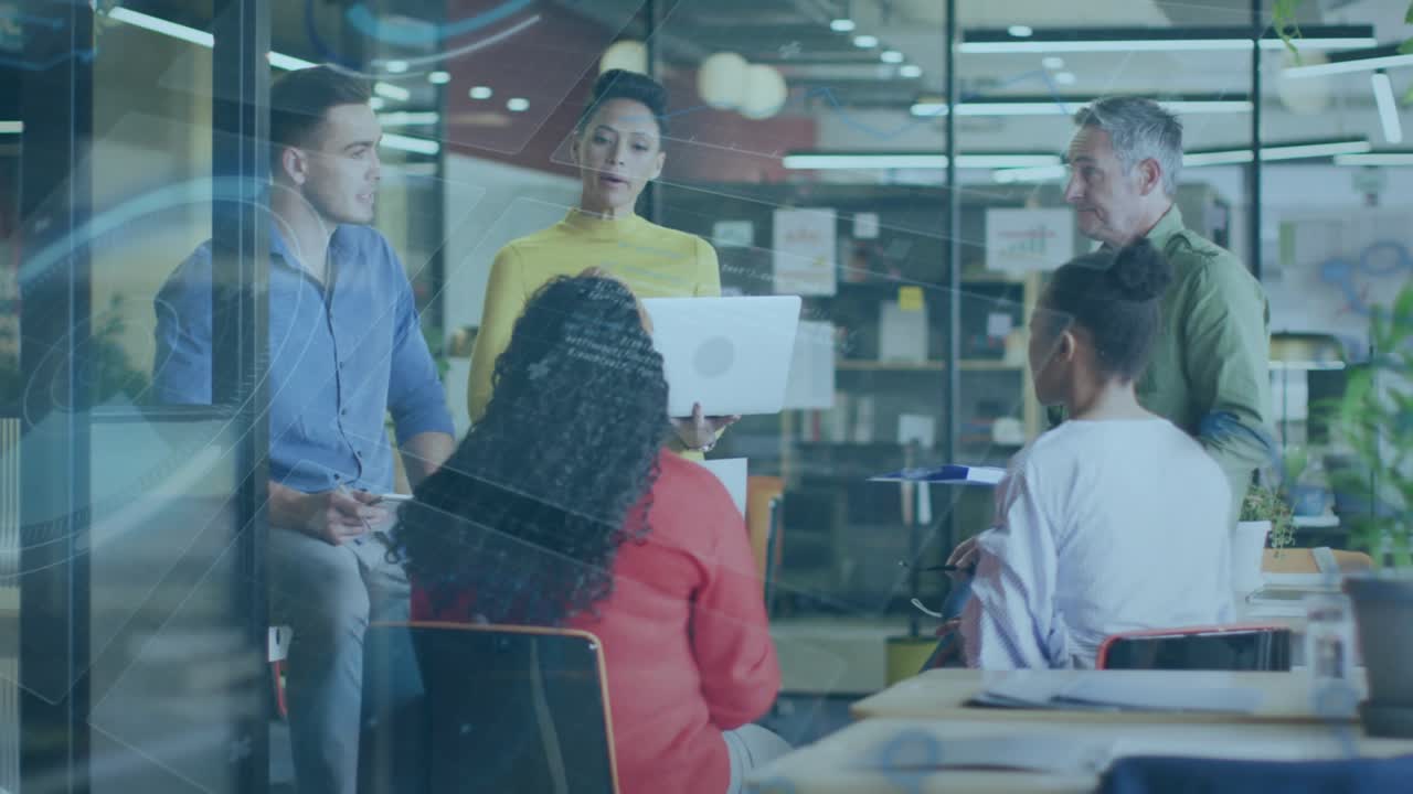 Woman in yellow top starting laptop demo, sparking business talk for project review with folder