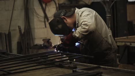 welder working on metal parts