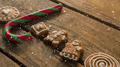 nieve cayendo con dulces de navidad decoraciones