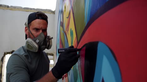 graffiti artist painting with marker on the wall 4k