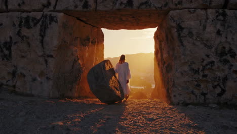 sunrise through a stone archway