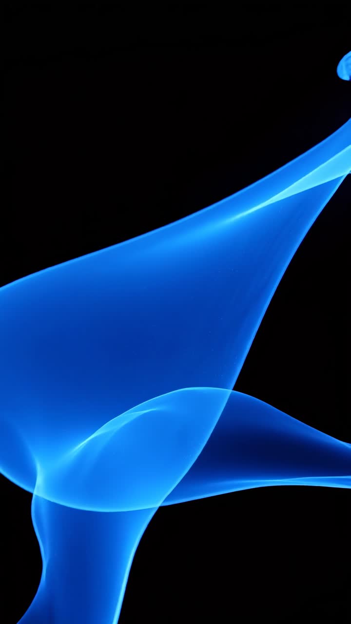 Abstract video background with a flowing blue wave, captured from a side angle