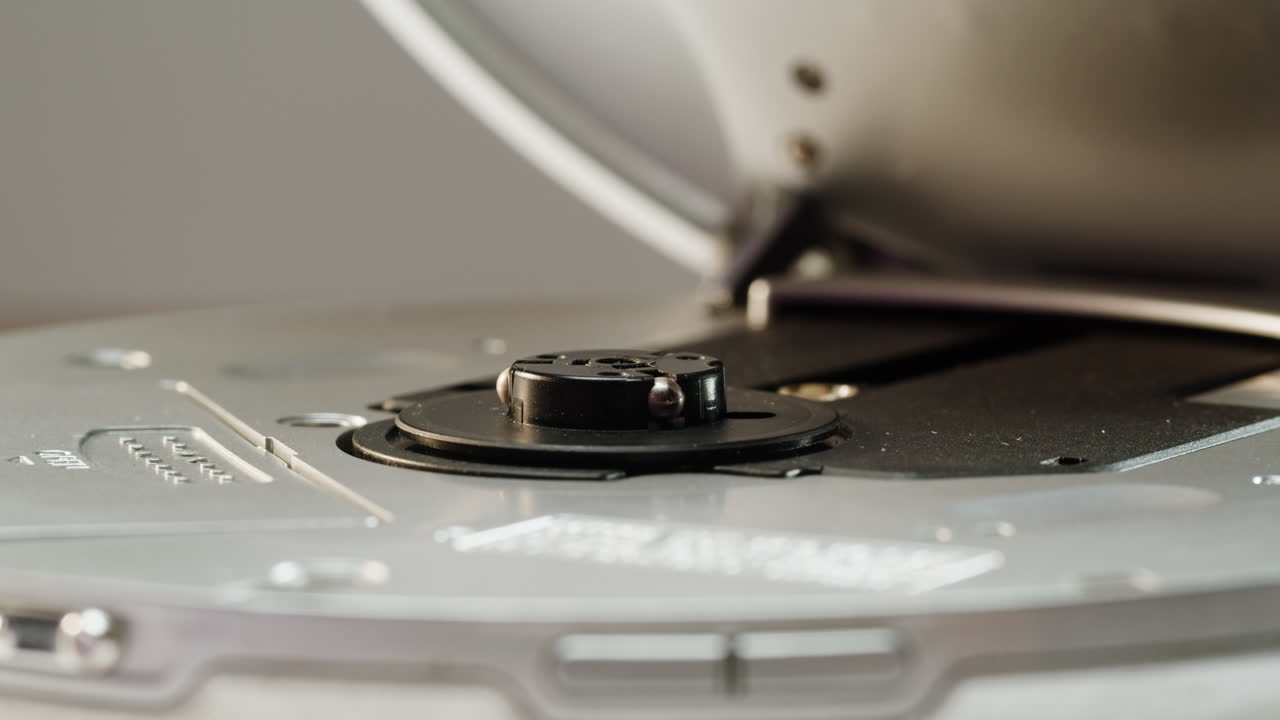 Vintage cd music player close-up. Using portable music player for listening with compact disc