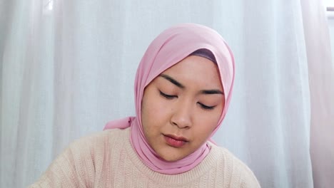 Female-Student-Listening-Intently-Whilst-Looking-Directly-into-Camera