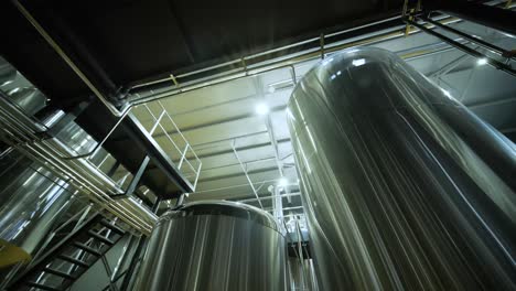 modern craft brewery. craft beer production. modern equipment in brewery, metal tanks, alcoholic drink production