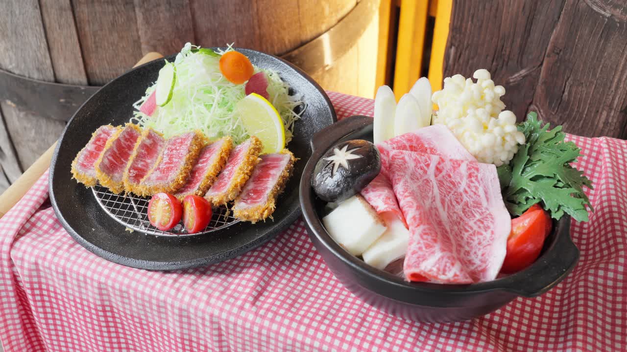A collection of realistic Japanese food samples and a serving of gyukatsu (beef cutlet) and sukiyaki (hot pot), showcasing Japan's diverse and detailed food culture
