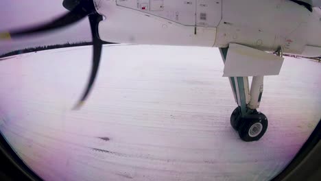 mirador sioux ontario norte de canadá, lapso de tiempo de despegue del avión, pequeño aeropuerto nevado de grava norte de canadá invierno