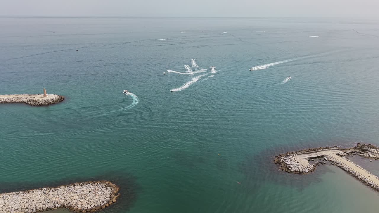 Boats leaving the marina in Marbella, Spain, aerial view
