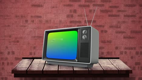 fernseher auf einem holztisch