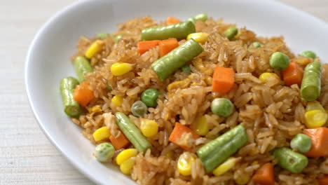 fried rice with green peas, carrot and corn - vegetarian and healthy food style