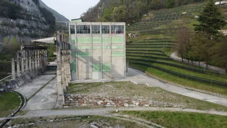 abandoned cement factory monument in the middle of nature drone 4k