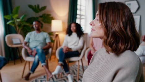 people attending a group therapy or support session