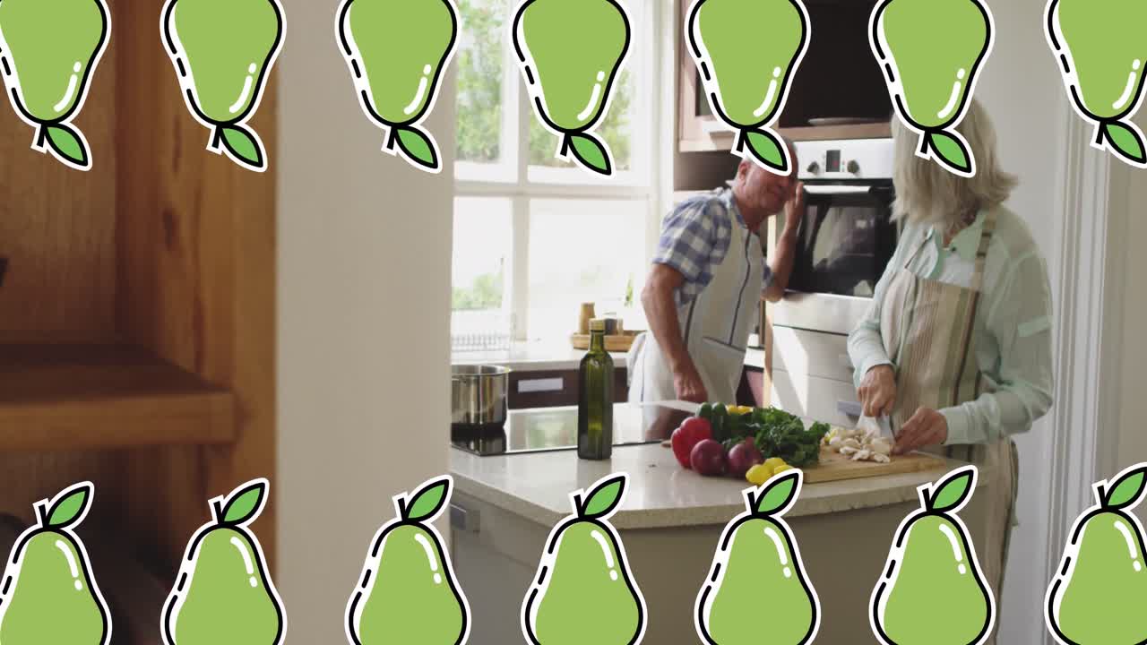 Animation of pear icons over senior caucasian couple cooking