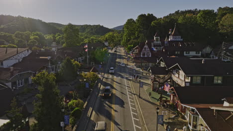 helen georgia aerial v10 low flyover touristic mountain town along the main street capturing traditional bavarian-style architectures on a beautiful sunny day - shot with mavic 3 cine - october 2022