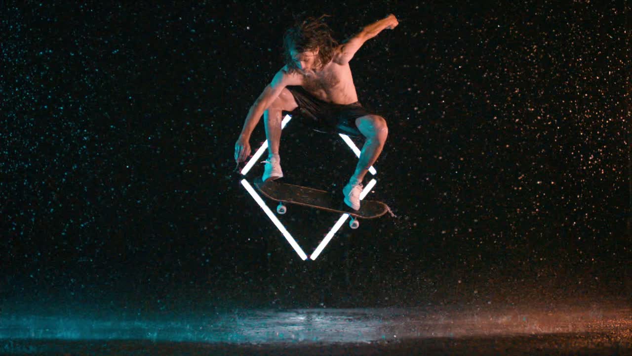Amazing skateboarding ollie trick in rain lighting, super slow motion