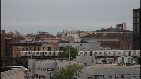 cityscape view of new york city subway train