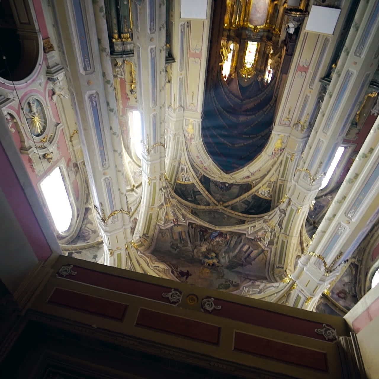 Interior of the old cathedral of the Assumption of the Blessed Virgin Mary. Beautiful view of religious building inside. Camera moves upside down.