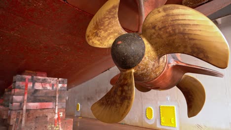 ships thruster seen in drydock before cleaning - moving slowly around twin screw schottel azimuth propeller - westcon norway