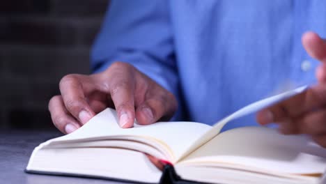 person reading an open book