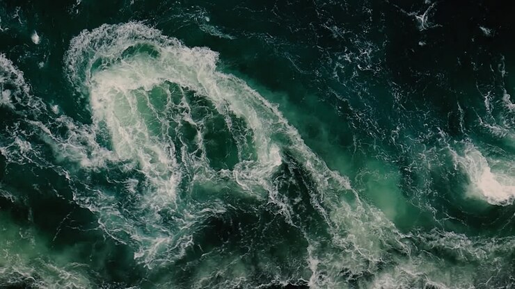 Waves of water of the river and the sea meet each other during high tide and low tide.