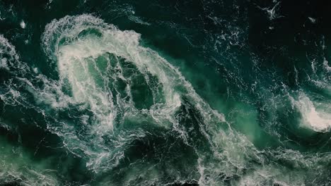 waves of water of the river and the sea meet each other during high tide and low tide.
