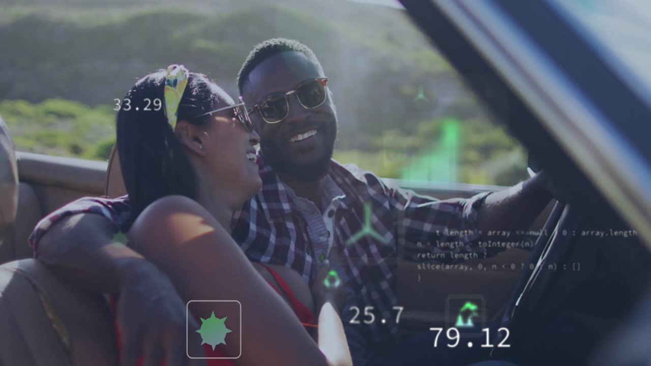 Couple enjoying car ride with digital code and graphics overlay animation