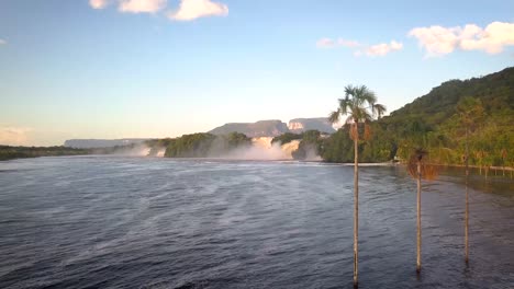 aerial view of the canaima's lake revealing the three palm trees in the shore