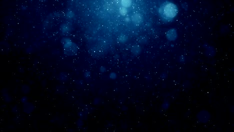 partículas de polvo azul abstracto luz bokeh títulos de movimiento bucle de fondo cinematográfico