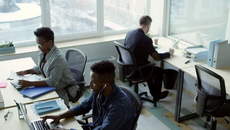 diverse employees working in comfortable office