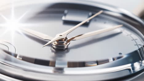 close-up of a watch face with bright glare and hands