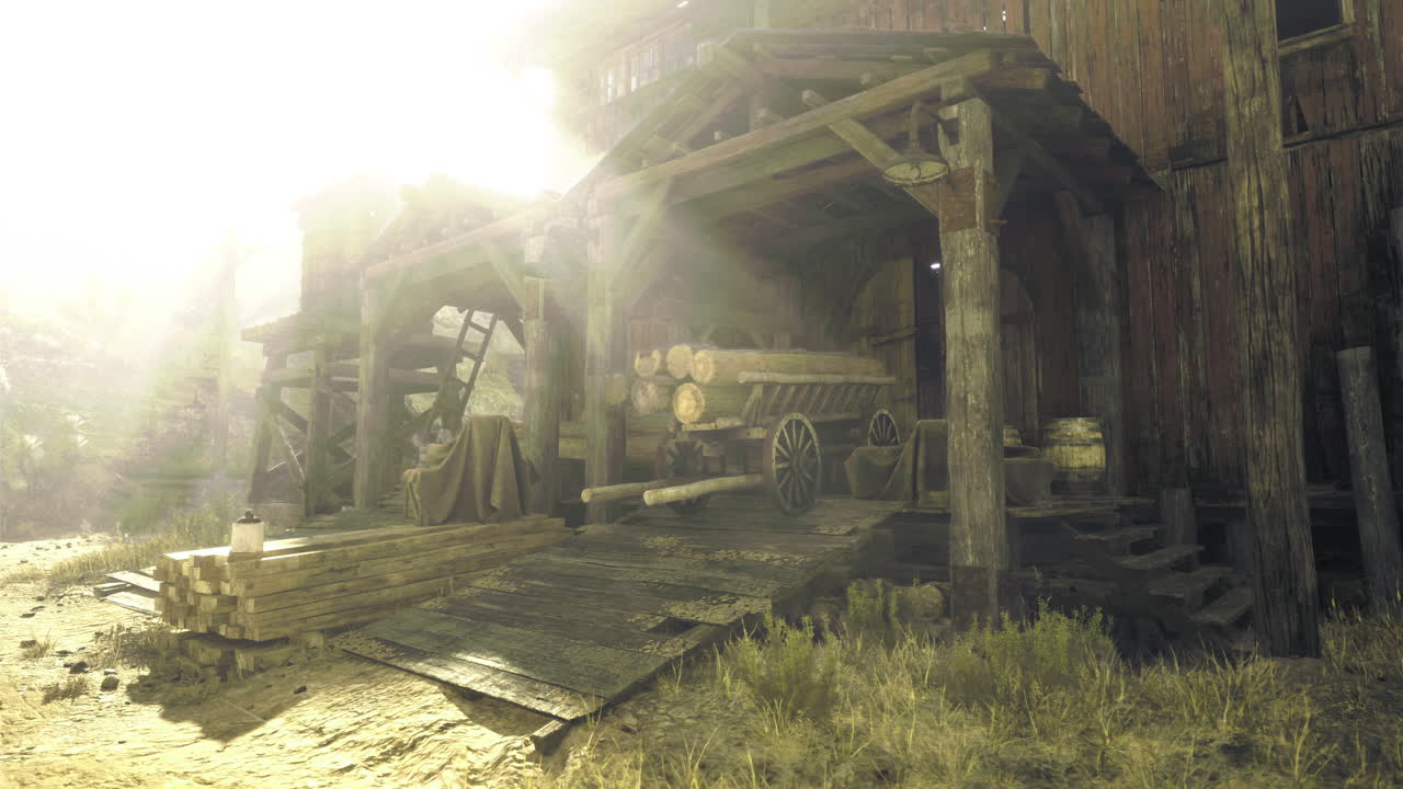 Wooden barn interior with logs and tools in a sunlit rural setting