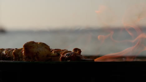 Close-up-view-of-skewers-on-the-barbecue