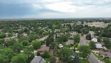 city of greeley drone flight over the residential area. beautiful streets, trees and nice houses
