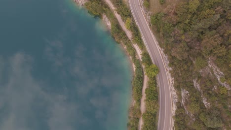 Artistic-shot-from-a-bird's-eye-view-of-a-celestial-reflection-in-a-brilliantly-clear-lake-ledro