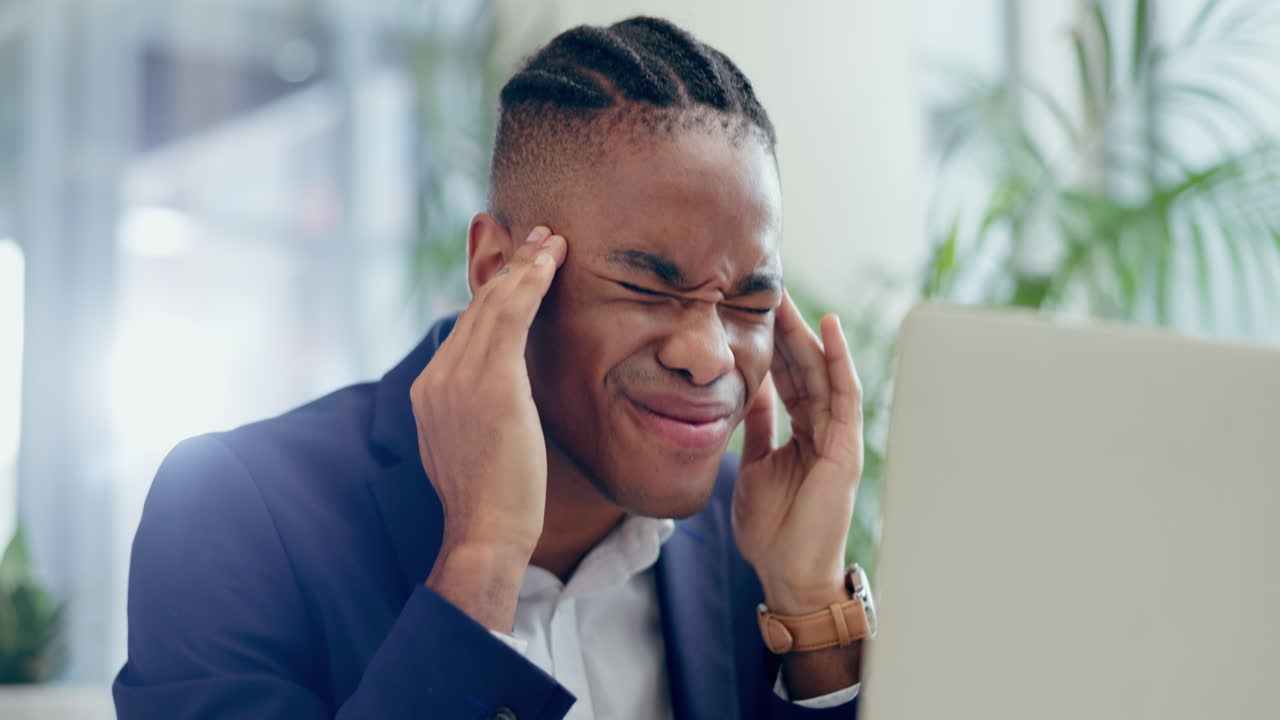 Business man, headache and pain at laptop for eye