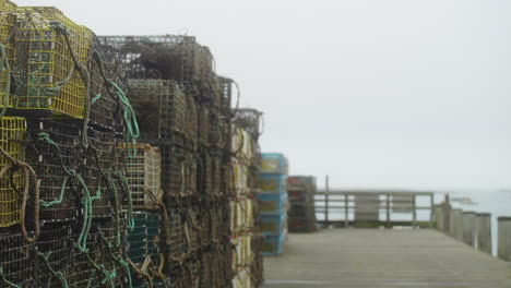 lobster traps on pier in maine new england with moody foggy weather 4k 60p
