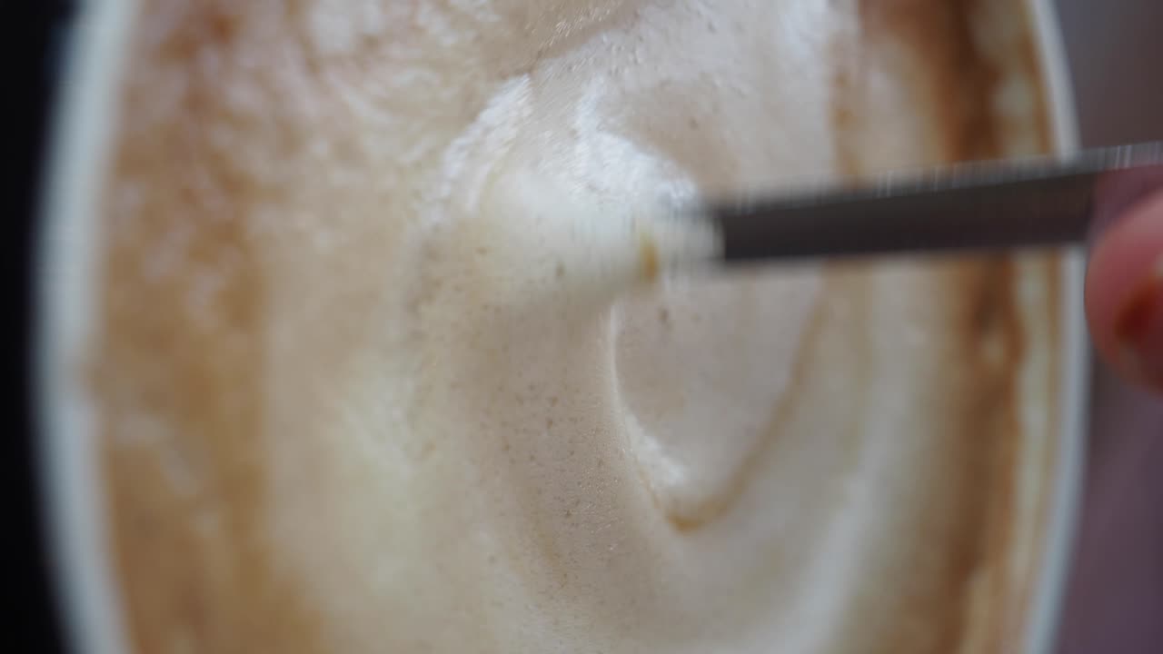 Closeup of a Latte with Frothy Foam