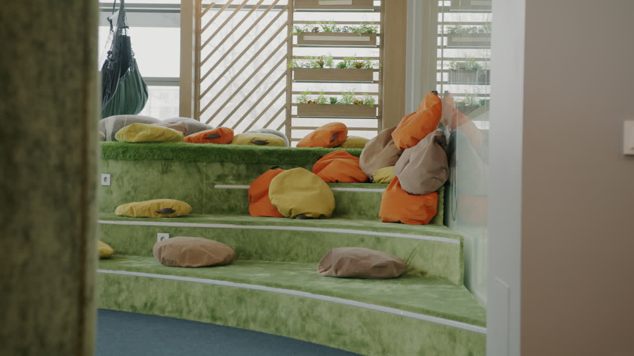 Modern Relaxation Area with Hammocks and Bean Bag Chairs