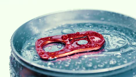 aluminum soda tin can lid cover of soft drink on ice goes around the circle.