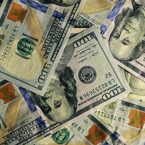 lot of one hundred of dollar bills