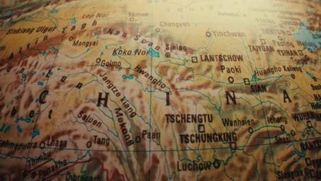 close-up of a vintage world globe map of asia