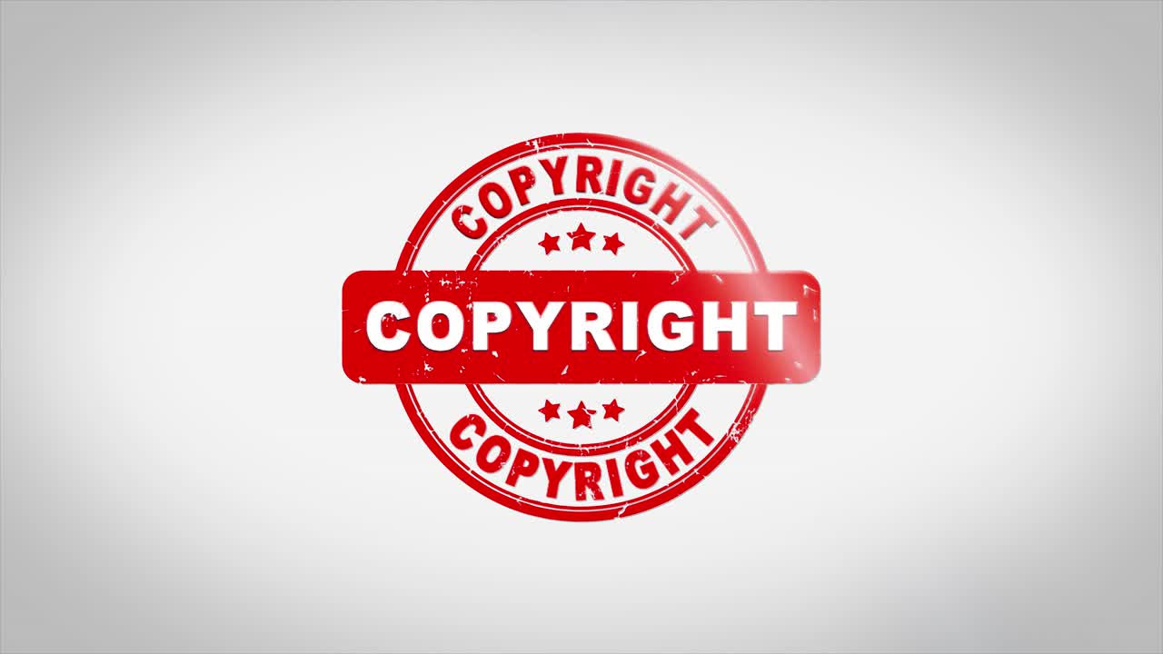 Copyright signed stamping text wooden stamp animation red ink on clean white paper surface