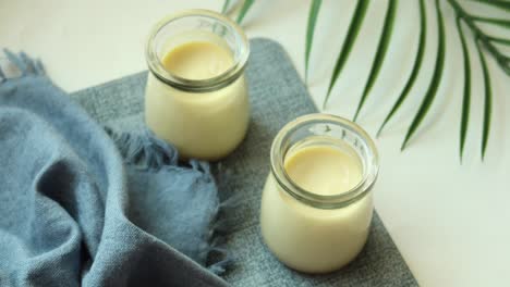 creamy custard in glass jars