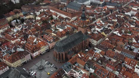 aerial view, church of the holy spirit in heidelberg, germany, old town landmark and buildings, drone shot