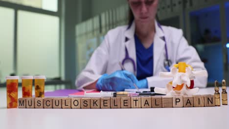 doctor and medical supplies for musculoskeletal pain management