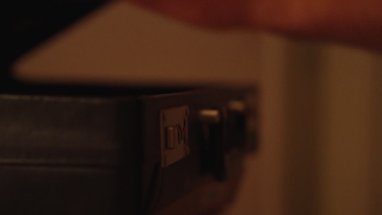 classic briefcase: black briefcase lock opens close up