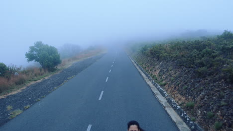 woman running on road close up shoes steadicam shot