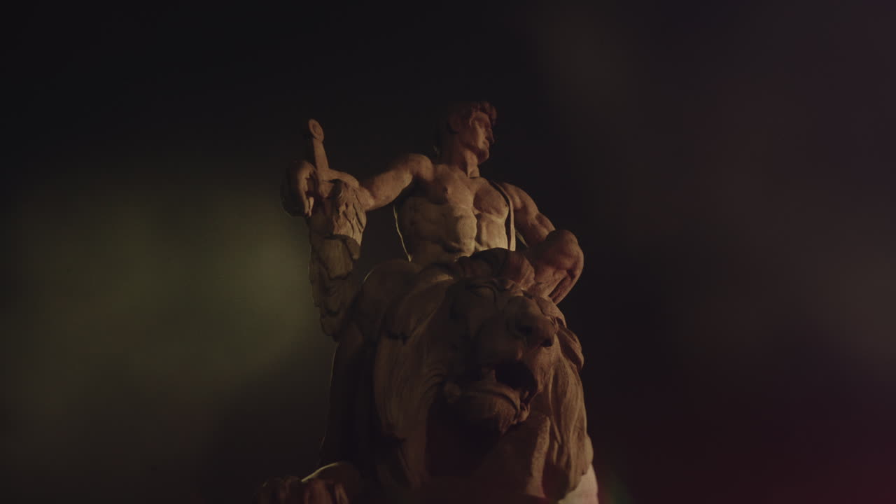 Epic, ancient stone statue at night